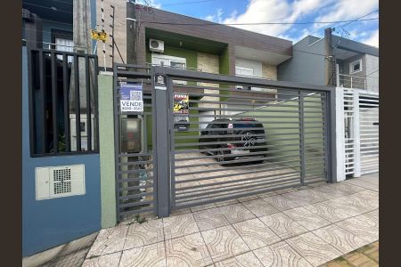 Casa à venda com 132m², 3 quartos e 2 vagas Casa à venda com 132m², 3 quartos e 2 vagasFachada/Placa