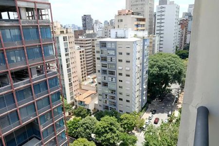 Apartamento à venda com 50m², 1 quarto e 1 vagaVista da cidade de São Paulo, com edifícios altos e árvores ao redor.