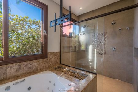 Casa de condomínio à venda com 519m², 4 quartos e 3 vagas