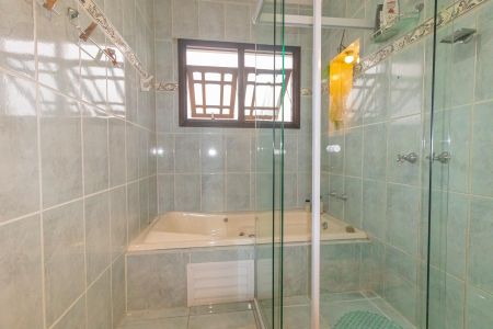 Casa à venda com 345m², 4 quartos e 2 vagas Casa à venda com 345m², 4 quartos e 2 vagasBanheiro da Suíte