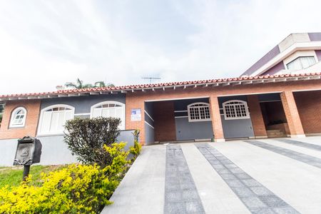 Casa de condomínio à venda com 440m², 4 quartos e 4 vagas Casa de condomínio à venda com 440m², 4 quartos e 4 vagasVista da Rua