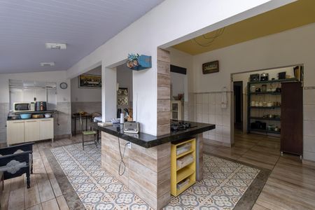 Casa à venda com 180m², 4 quartos e 2 vagas Casa à venda com 180m², 4 quartos e 2 vagasCozinha e Área de Serviço