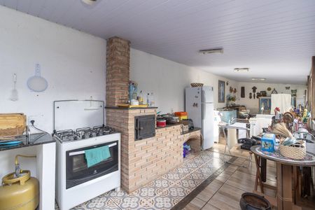 Casa à venda com 180m², 4 quartos e 2 vagas Casa à venda com 180m², 4 quartos e 2 vagasCozinha e Área de Serviço