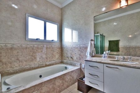 Casa de condomínio à venda com 371m², 4 quartos e 4 vagas