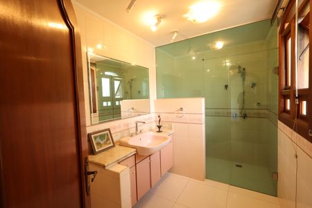 Casa de condomínio para alugar com 853m², 4 quartos e 6 vagasBanheiro da Suíte 3