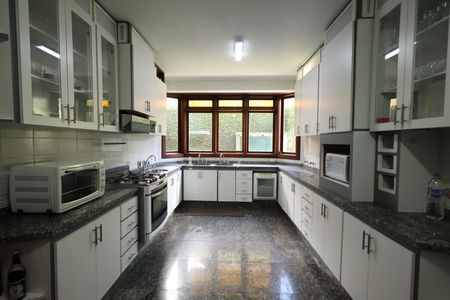 Casa de condomínio para alugar com 853m², 4 quartos e 6 vagasCozinha