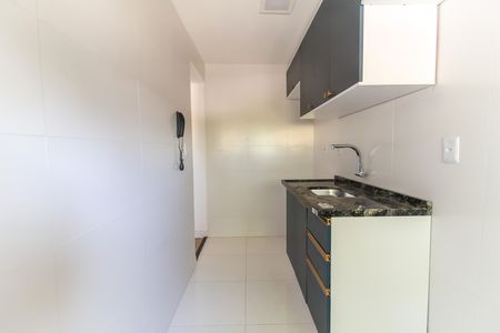 Apartamento à venda com 40m², 2 quartos e 1 vaga Apartamento à venda com 40m², 2 quartos e 1 vagaCozinha e Área de Serviço