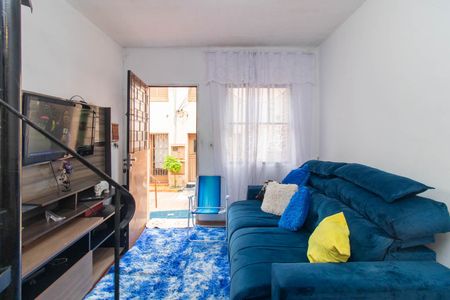 Sala de casa de condomínio à venda com 2 quartos, 48m² em São José, Porto Alegre
