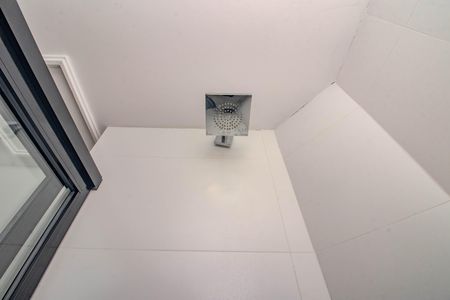 Banheiro de kitnet/studio para alugar com 1 quarto, 42m² em Auxiliadora, Porto Alegre
