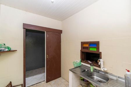 Casa à venda com 560m², 5 quartos e 6 vagasCasa frente - Cozinha