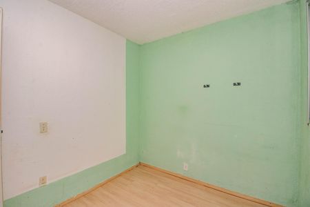 Quarto 1 de apartamento para alugar com 2 quartos, 50m² em Mário Quintana, Porto Alegre