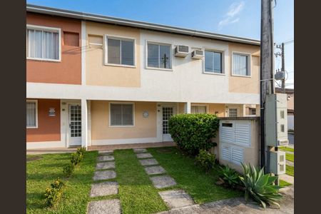 Casa de condomínio à venda com 86m², 3 quartos e 2 vagas Casa de condomínio à venda com 86m², 3 quartos e 2 vagasFachada