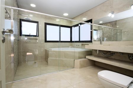 Casa de condomínio para alugar com 750m², 4 quartos e 8 vagas Casa de condomínio para alugar com 750m², 4 quartos e 8 vagasBanheiro da Suíte 1