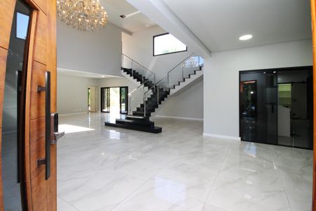 Casa de condomínio para alugar com 750m², 4 quartos e 8 vagas Casa de condomínio para alugar com 750m², 4 quartos e 8 vagasEntrada