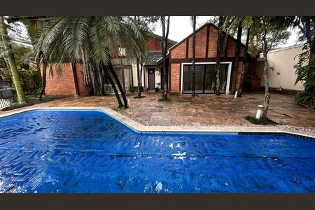 Casa de condomínio para alugar com 458m², 4 quartos e 5 vagas