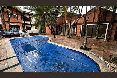 Casa de condomínio para alugar com 458m², 4 quartos e 5 vagas