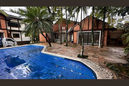 Casa de condomínio para alugar com 458m², 4 quartos e 5 vagas