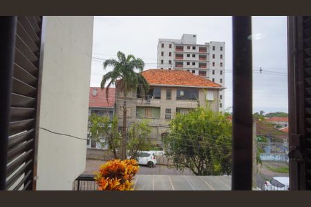 Vista da Rua de casa à venda com 3 quartos, 200m² em Jardim São Pedro, Porto Alegre