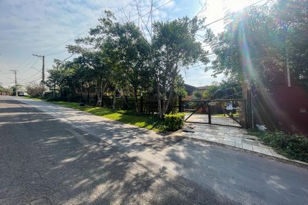 Casa de condomínio para alugar com 600m², 5 quartos e 4 vagas Casa de condomínio para alugar com 600m², 5 quartos e 4 vagasFachada da Rua