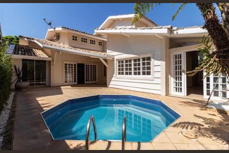 Casa de condomínio à venda com 390m², 4 quartos e 4 vagas Casa de condomínio à venda com 390m², 4 quartos e 4 vagasFoto 01