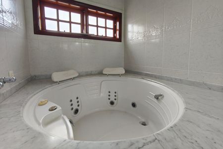 Casa de condomínio à venda com 247m², 3 quartos e 2 vagas Casa de condomínio à venda com 247m², 3 quartos e 2 vagasBanheiro Suíte