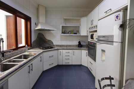 Casa de condomínio à venda com 247m², 3 quartos e 2 vagas Casa de condomínio à venda com 247m², 3 quartos e 2 vagasCozinha