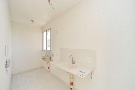 Apartamento à venda com 42m², 2 quartos e 1 vaga Apartamento à venda com 42m², 2 quartos e 1 vagaCozinha e Área de serviço