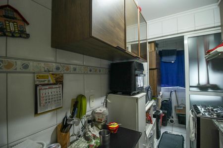 Apartamento à venda com 48m², 2 quartos e 1 vaga Apartamento à venda com 48m², 2 quartos e 1 vagaCozinha e Área de Serviço
