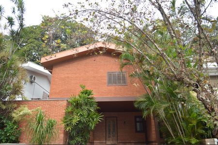 Casa de condomínio para alugar com 256m², 5 quartos e 4 vagasFachada 