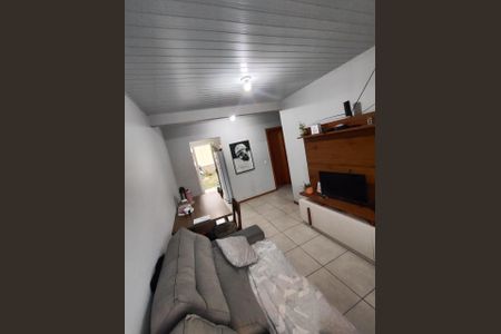 Sala de casa de condomínio para alugar com 2 quartos, 48m² em Formoza, Alvorada