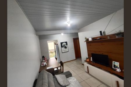 Sala de casa de condomínio para alugar com 2 quartos, 48m² em Formoza, Alvorada