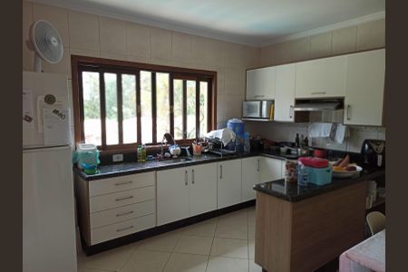Casa de condomínio à venda com 330m², 4 quartos e 3 vagas Casa de condomínio à venda com 330m², 4 quartos e 3 vagasCozinha