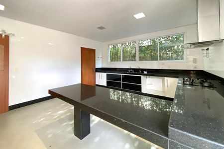 Casa de condomínio à venda com 455m², 4 quartos e 4 vagas Casa de condomínio à venda com 455m², 4 quartos e 4 vagasCozinha