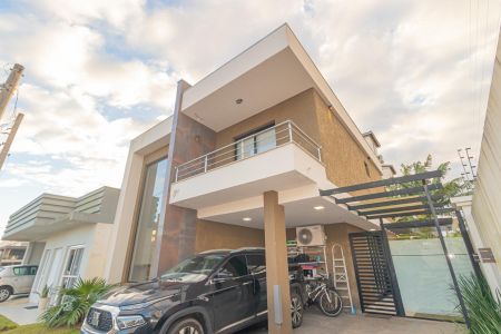Casa de condomínio para alugar com 168m², 4 quartos e 2 vagas Casa de condomínio para alugar com 168m², 4 quartos e 2 vagasFachada