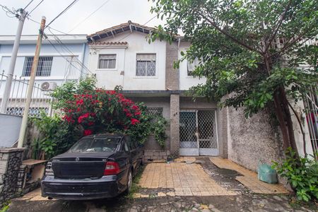Casa à venda com 150m², 4 quartos e 4 vagas Casa à venda com 150m², 4 quartos e 4 vagasFachada e garagem