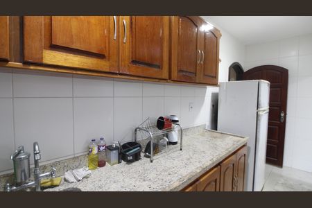 Casa de condomínio para alugar com 220m², 4 quartos e 2 vagasCozinha