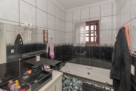 Casa à venda com 270m², 3 quartos e 2 vagasBanheiro da Suíte 1