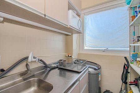 Cozinha de apartamento à venda com 1 quarto, 56m² em Petrópolis, Porto Alegre