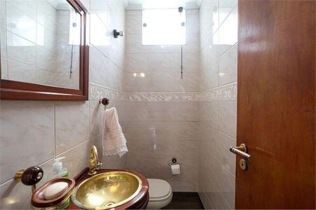 Casa à venda com 238m², 4 quartos e 4 vagas