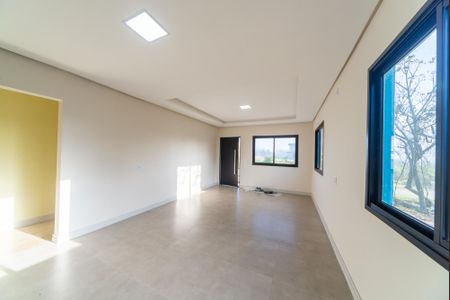 Sala de casa de condomínio para alugar com 3 quartos, 117m² em Florescente, Viamão