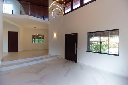 Casa de condomínio para alugar com 380m², 4 quartos e 5 vagasSala 1