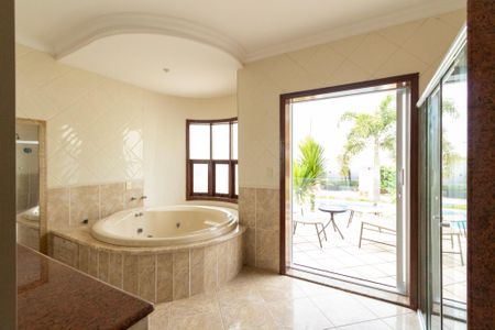 Casa de condomínio para alugar com 415m², 4 quartos e 8 vagas Casa de condomínio para alugar com 415m², 4 quartos e 8 vagasBanheiro - Suíte 2