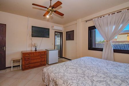 Suíte 1 de casa para alugar com 2 quartos, 280m² em Jardim Dona Leopoldina, Porto Alegre