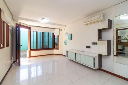 Sala de casa de condomínio para alugar com 3 quartos, 156m² em Ipanema, Porto Alegre