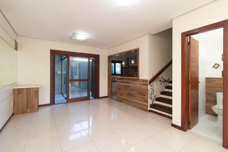 Sala de casa de condomínio para alugar com 3 quartos, 156m² em Ipanema, Porto Alegre
