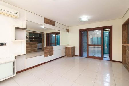 Sala de casa de condomínio para alugar com 3 quartos, 156m² em Ipanema, Porto Alegre