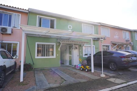 Casa de condomínio à venda com 92m², 2 quartos e 2 vagas Casa de condomínio à venda com 92m², 2 quartos e 2 vagasFachada