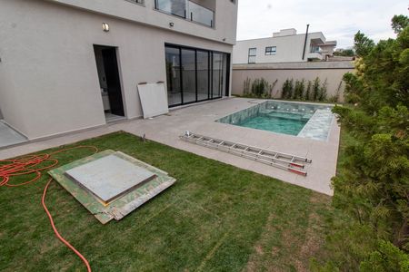 Casa de condomínio à venda com 350m², 4 quartos e 4 vagas Casa de condomínio à venda com 350m², 4 quartos e 4 vagasÁREA EXTERNA FUNDOS