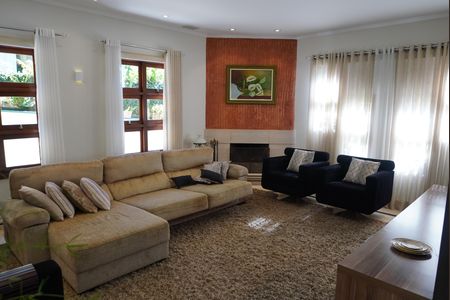 Casa de condomínio para alugar com 620m², 4 quartos e 6 vagasSala de TV