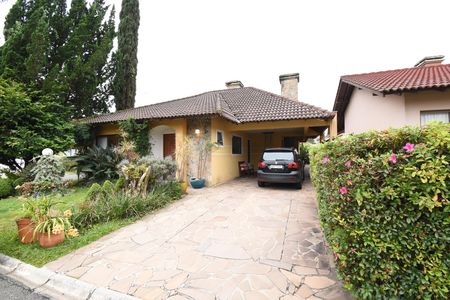 Casa de condomínio à venda com 200m², 4 quartos e 2 vagasÁrea externa - Frente